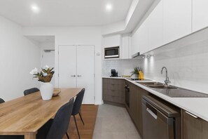 Fridge, microwave, oven, stovetop - Bright Newly 2 Bed Apartment with Balcony Views (Cannington)
