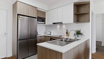 Coffee/tea maker, fridge, microwave, oven