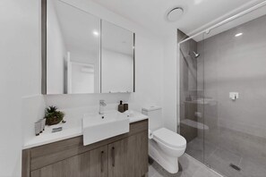 Shower, towels, shampoo - Brand New 2 Bed Apartment with City Views (Cannington)