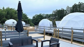 A deck with outdoor seating and white dome tents. - Room Only Experience playing the guqin and throw / Kimitsu City Chiba (Kimitsu City)