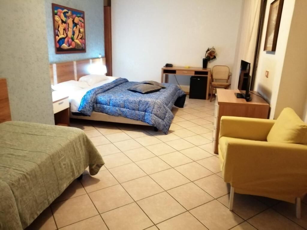 Basic Triple Room, Balcony, Garden View