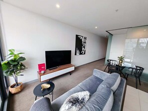 Living area - Homey Comfort at Victoria Market! 2 Bedrooms | 1 Bathroom (Carlton)