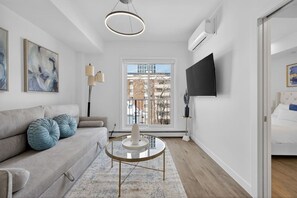 Living area - 2BR | Downtown | AC | Mins to Saddledome (Calgary)