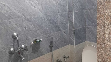 Shower, towels, soap, shampoo