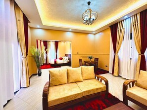 スーペリア スイート バルコニー プールビュー | リビング エリア