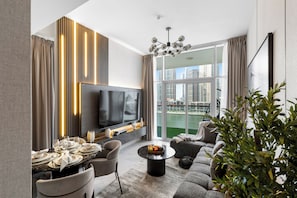 Flat-screen TV - 2BR Premium Canal & Burj Khalifa View (Dubai)