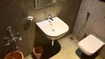 Shower, free toiletries, towels, toilet paper