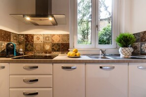 Fridge, microwave, stovetop, coffee/tea maker - Santonofrio Colors - Three Bedroom Apartment, Sleeps 8 (Rome)