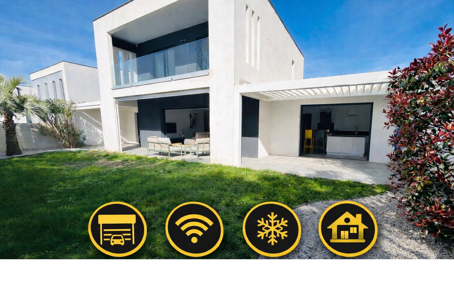 A modern two-story house with a garage, WiFi, a covered outdoor area, and a garden.