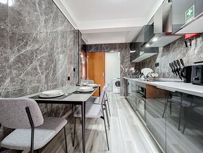 Fridge, microwave, oven, stovetop - StarFish Apartment by Atlantic Holiday (Calheta)
