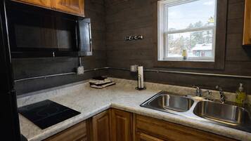 Studio, plusieurs lits, cuisine, vue jardin (Outback Shack) | Vue de la chambre