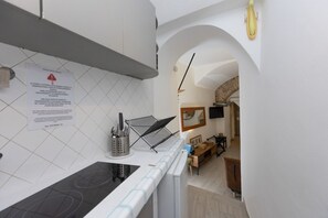 Interior - GuestHost - Practical and welcoming 38 square meters apartment, perfect for two people, located on the basement level of a period building (NO elevator, NO views).The property is in an extremely strategic location (in a pedestrian area, limited traffic a (Rome)