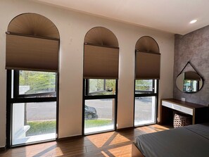 Standard Quadruple Room, City View | Blackout drapes, soundproofing, iron/ironing board, free WiFi - Ha Lan Homestay Grand World Phu Quoc (Phu Quoc)