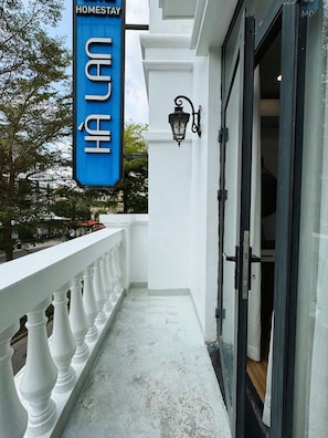 Quarto casal luxo, sacada, vista para a cidade