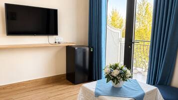 Deluxe Quadruple Room, Balcony, City View | Free WiFi