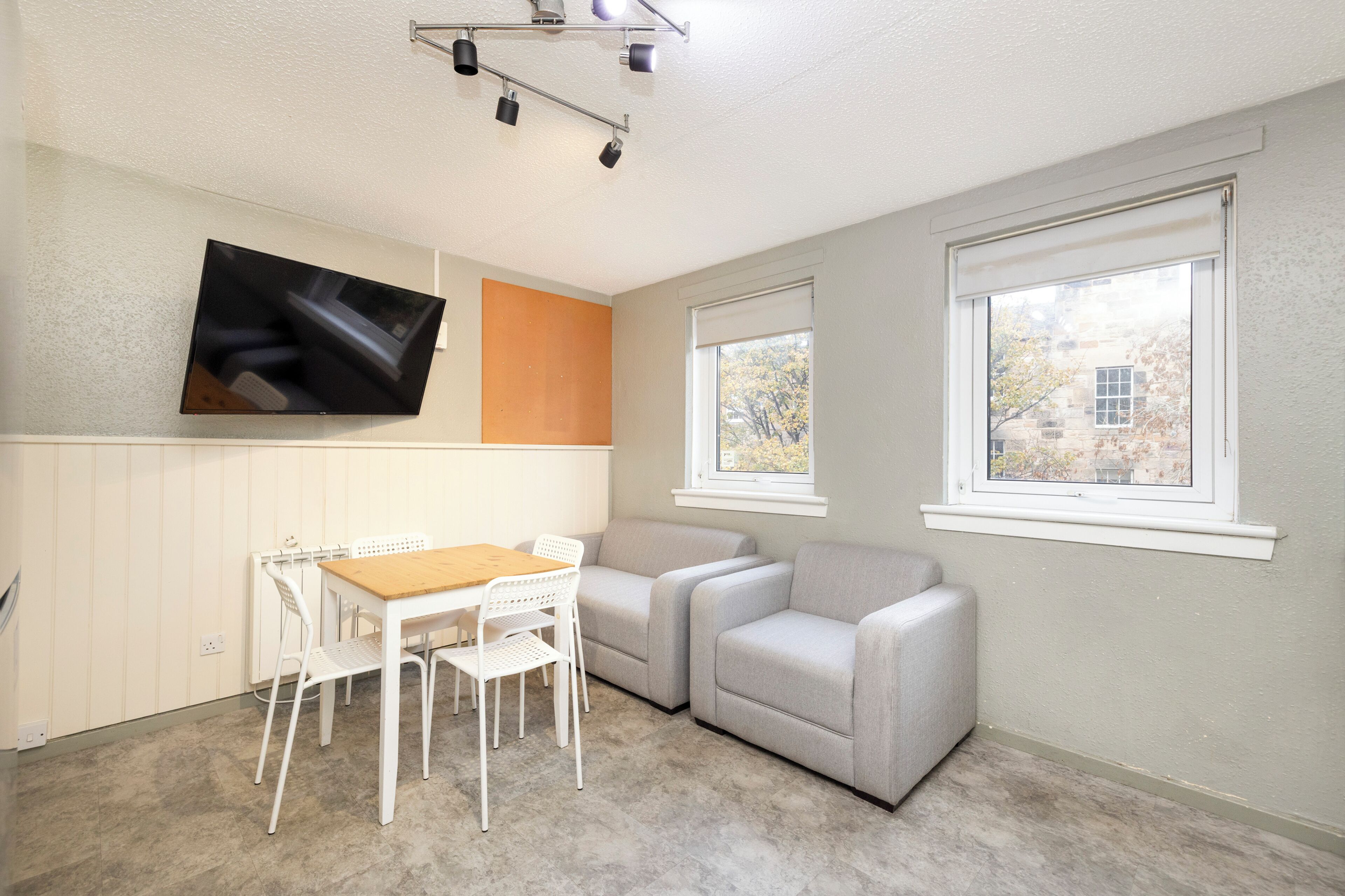 Desk, laptop workspace, blackout curtains, iron/ironing board