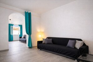 Chambre Familiale | Coin séjour