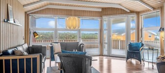 Lovely holiday home with covered and enclosed terrace, close to the sea.