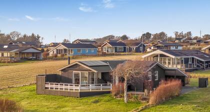 Holiday home with fjord view, wilderness bath and hot tub