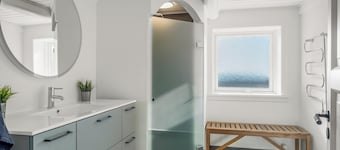Luxury house with outdoor hot tub and activity room, and unique view of Thy.