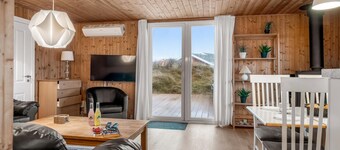 Lovely holiday home with a large terrace and outdoor hot tub, 500 meters from.