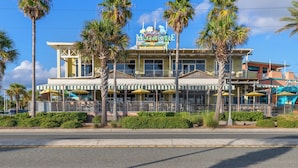 A building with a sign reading "Margaritaville" and a beachside location. - The Winking Turtle – Your Shell-tered Beach Escape! Sleeps 10! (Inlet Beach)