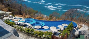 Stunning 2nd-Level | Views of Ocean, Beach & Pool