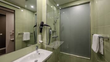 Hair dryer, towels, soap, shampoo