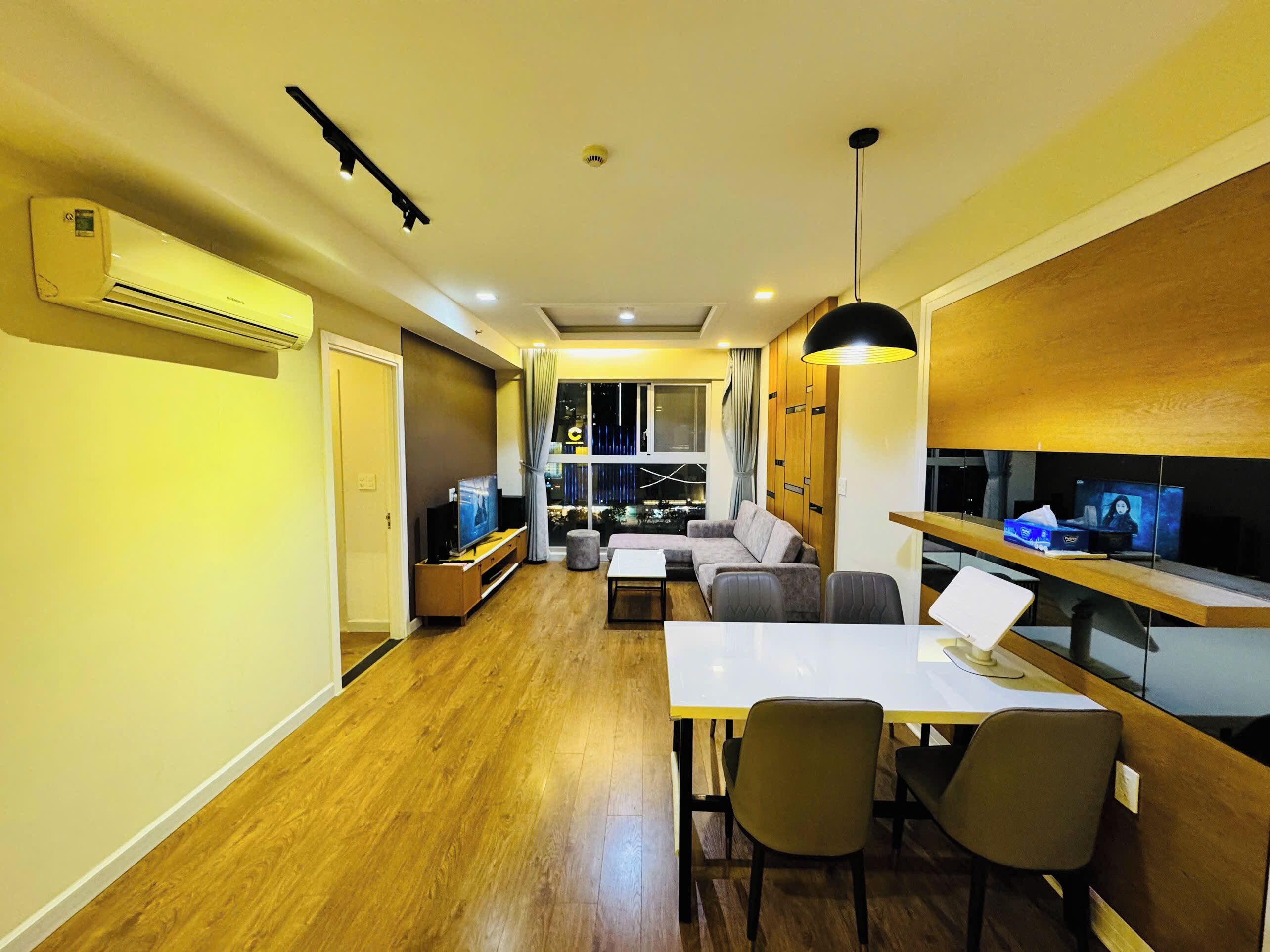 Family Apartment, 2 Bedrooms, City View | Living area | 55-inch Smart TV with satellite channels