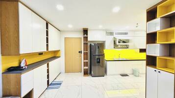 Family Apartment, 2 Bedrooms, City View | Private kitchen | Full-size fridge, microwave, oven, stovetop