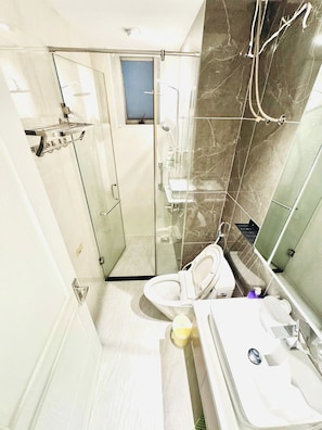 Family Apartment, 2 Bedrooms, City View | Bathroom | Hydromassage showerhead, designer toiletries, hair dryer, slippers - Scenic Valley 2 EmHouse (Ho Chi Minh City)