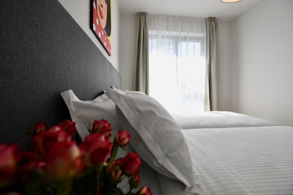 Comfort Apartment, 1 Bedroom, Balcony, City View | In-room safe, blackout drapes, soundproofing, iron/ironing board