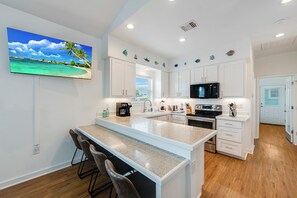 Fridge, microwave, oven, stovetop - Cozy Port A Retreat | Pet-Friendly | Screened Patio (Port Aransas)