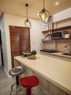 Standard Studio, 1 Queen Bed, Kitchenette | Private kitchenette | Fridge, microwave, stovetop, dishwasher - Cozy City Studio at Seibu Tower (Taguig)