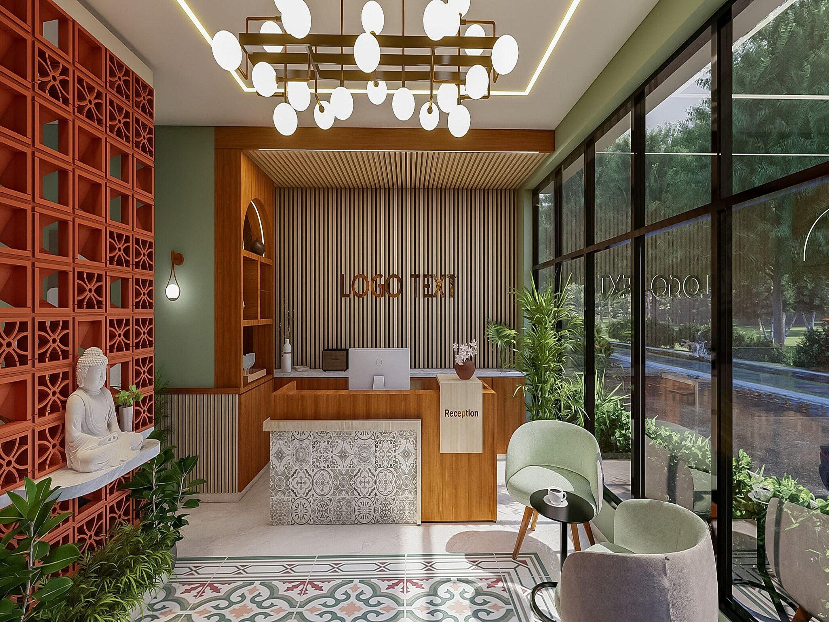 A reception desk with a modern design, a Buddha statue, and a view of the outdoors through large windows.