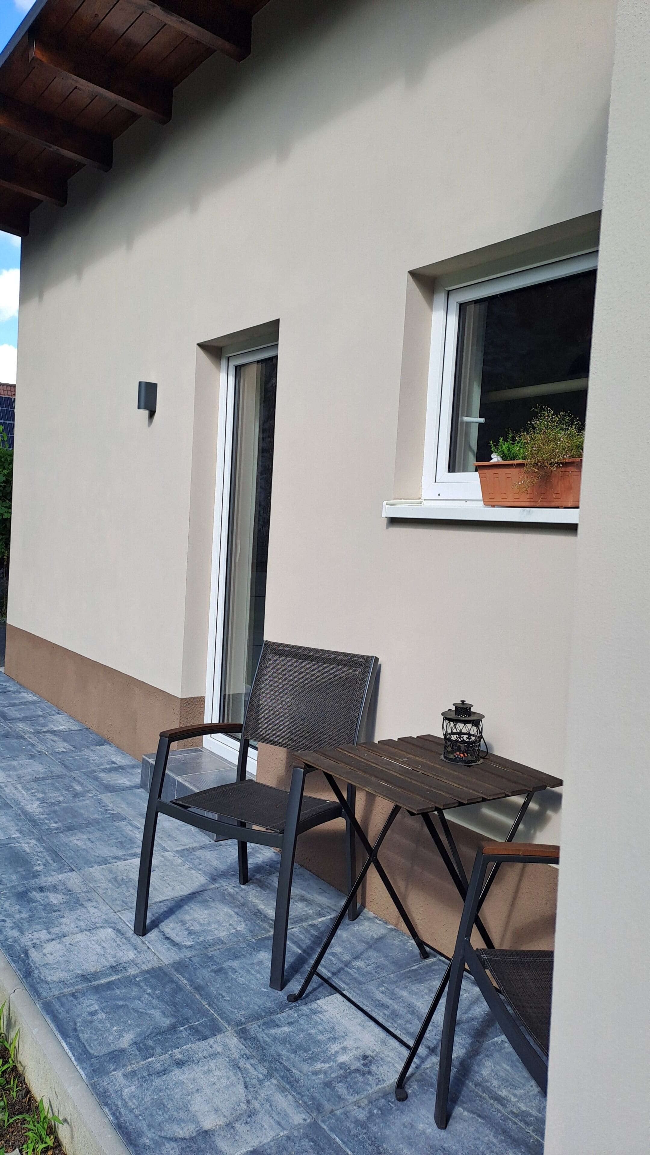 Studio Deluxe - utsikt mot trädgården | Restaurang utomhus