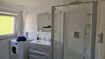 Shower, hair dryer, towels