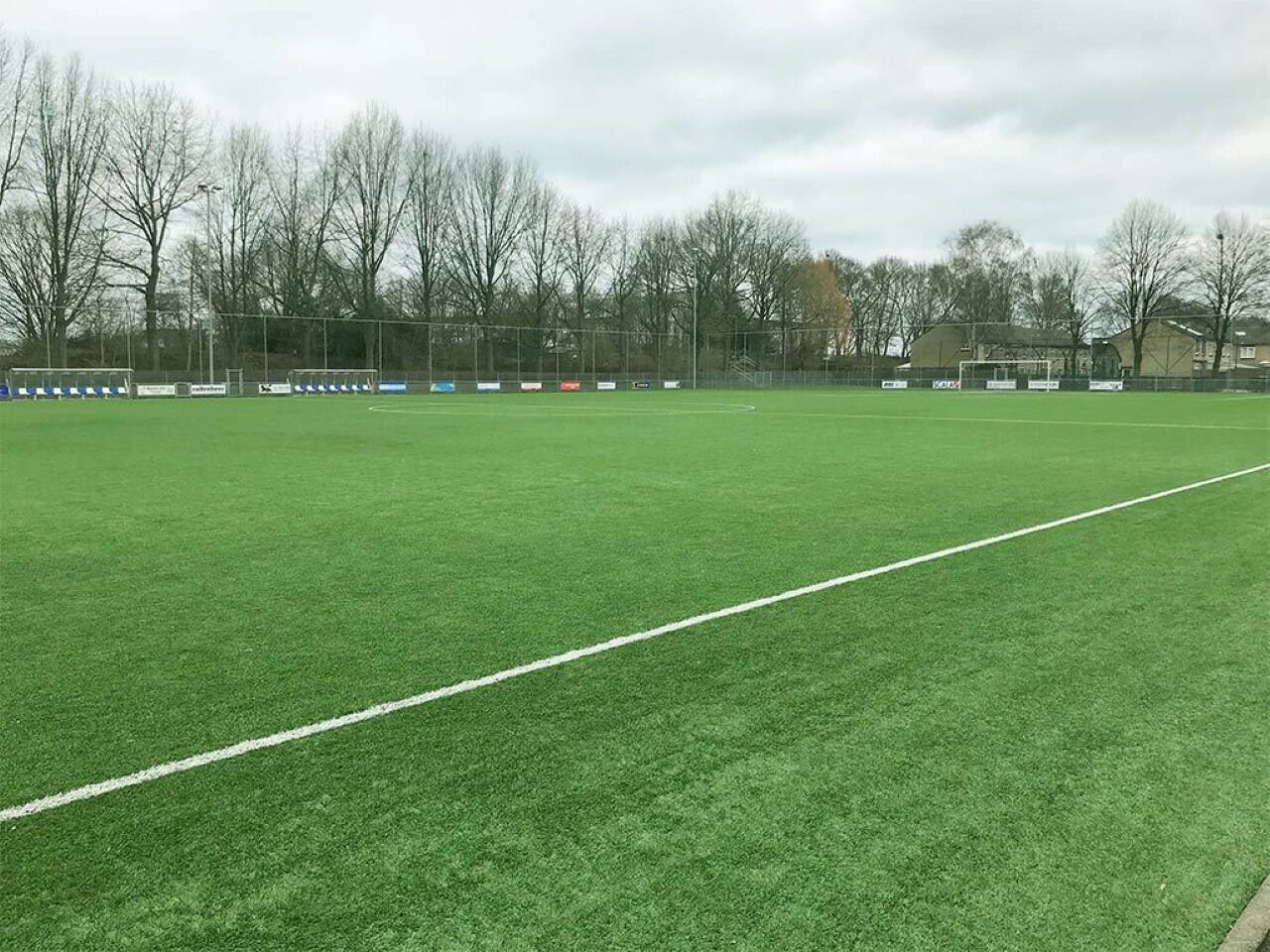 Kick off a casual game on the open green field.