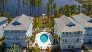 A resort with a swimming pool, beachfront view, and multiple buildings. - The Pearl At Oyster Lake | Chic Coastal Home, 0.4mi to Beach Access + Bikes (Santa Rosa  Beach)