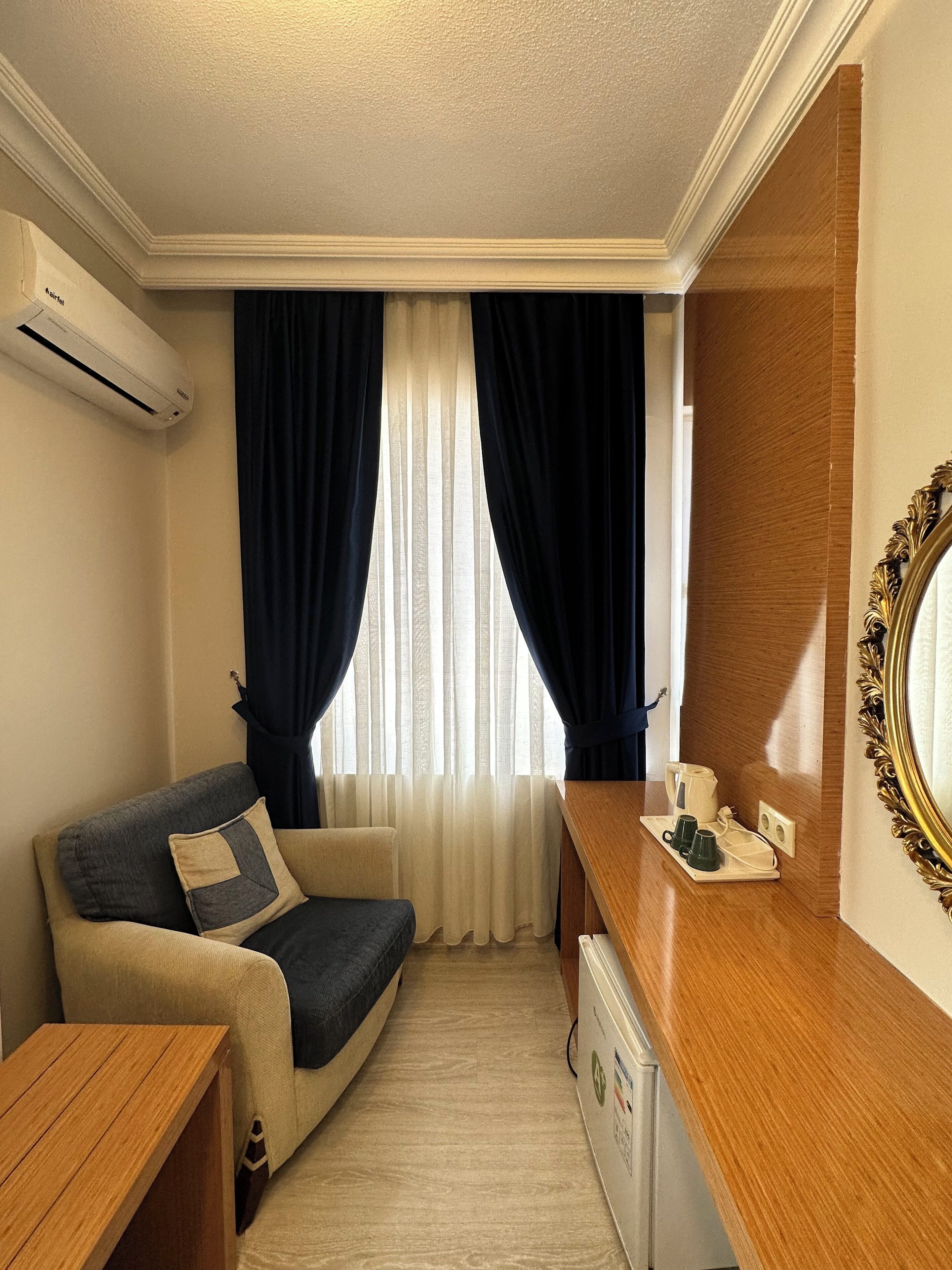 Superior trippelrum - utsikt mot staden | Vardagsrum