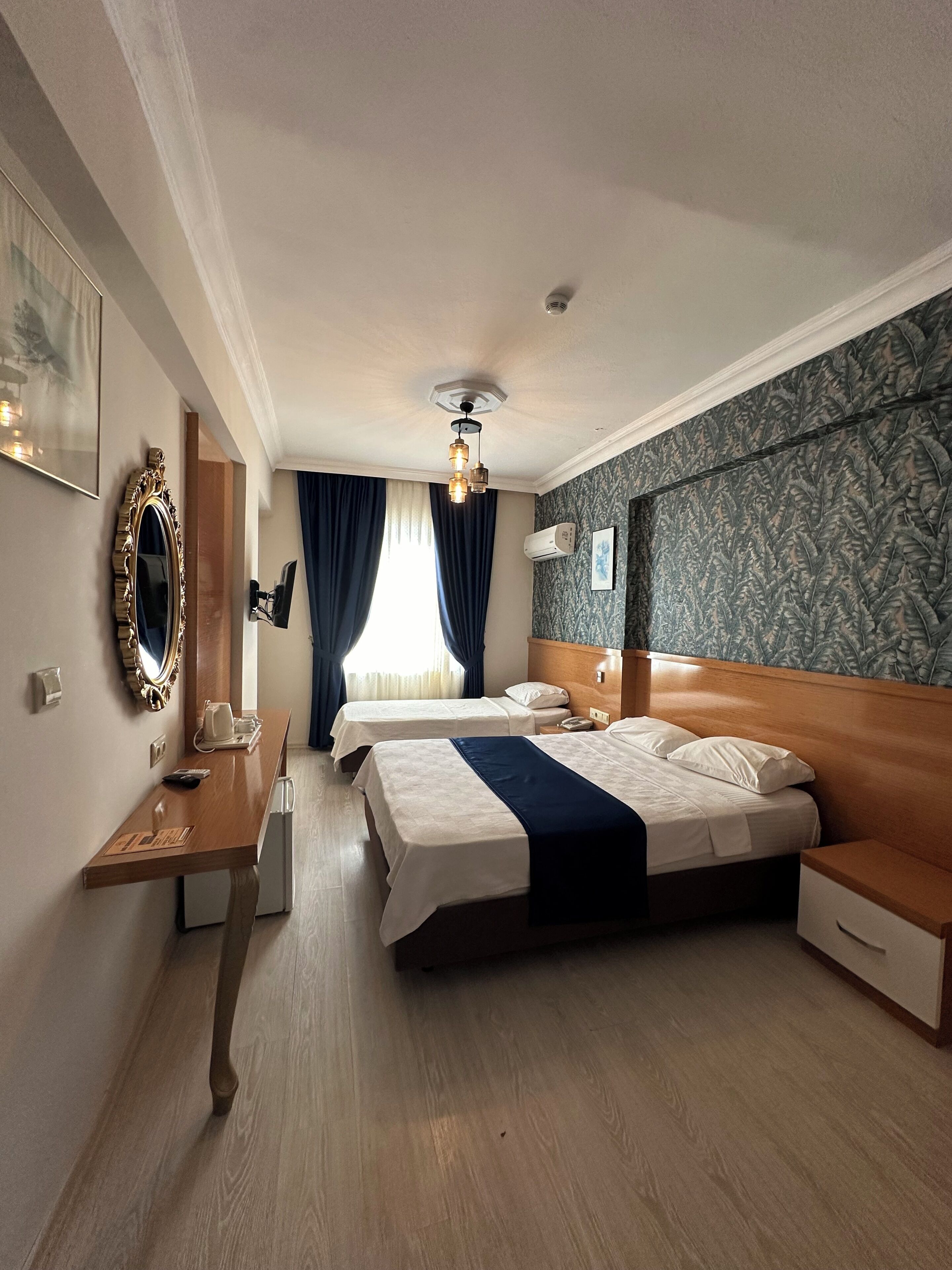 Deluxe Triple Room | Premium bedding, minibar, in-room safe, iron/ironing board