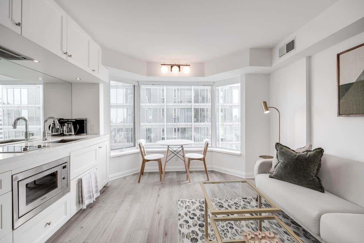 Cozy dining space perfect for enjoying meals, coffee, or planning your day in the city.