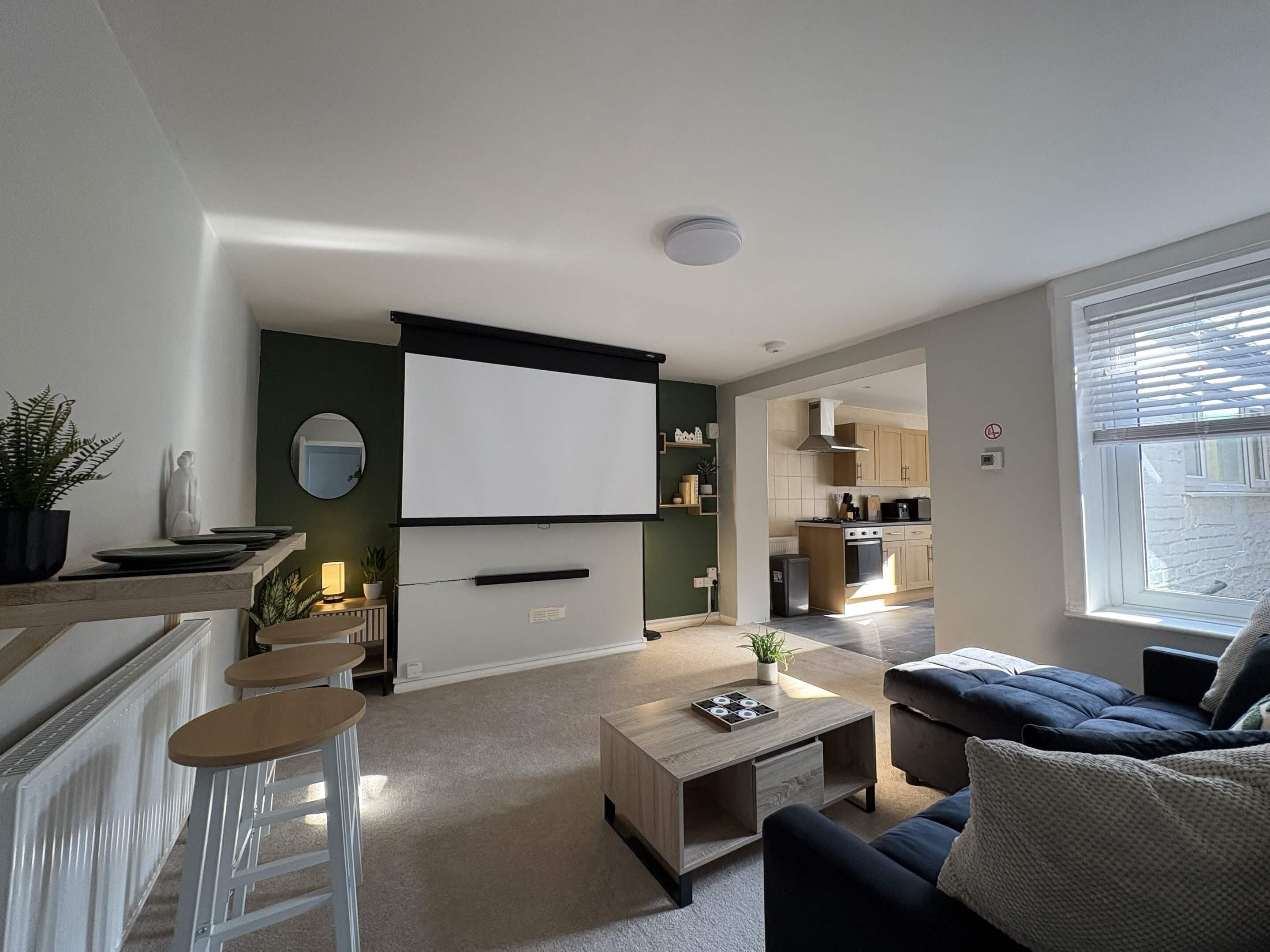 Spacious living room with home cinema set up
