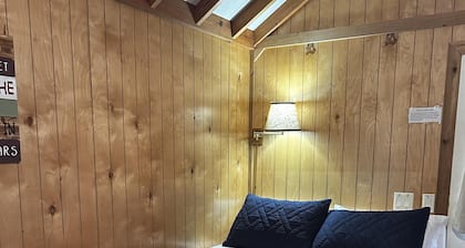 Deluxe Cabin - The Bear Den - Our Deluxe Cabins offer comfort with a true Okefenokee feel. Climate controlled, private, and set in a quiet part of the campground.