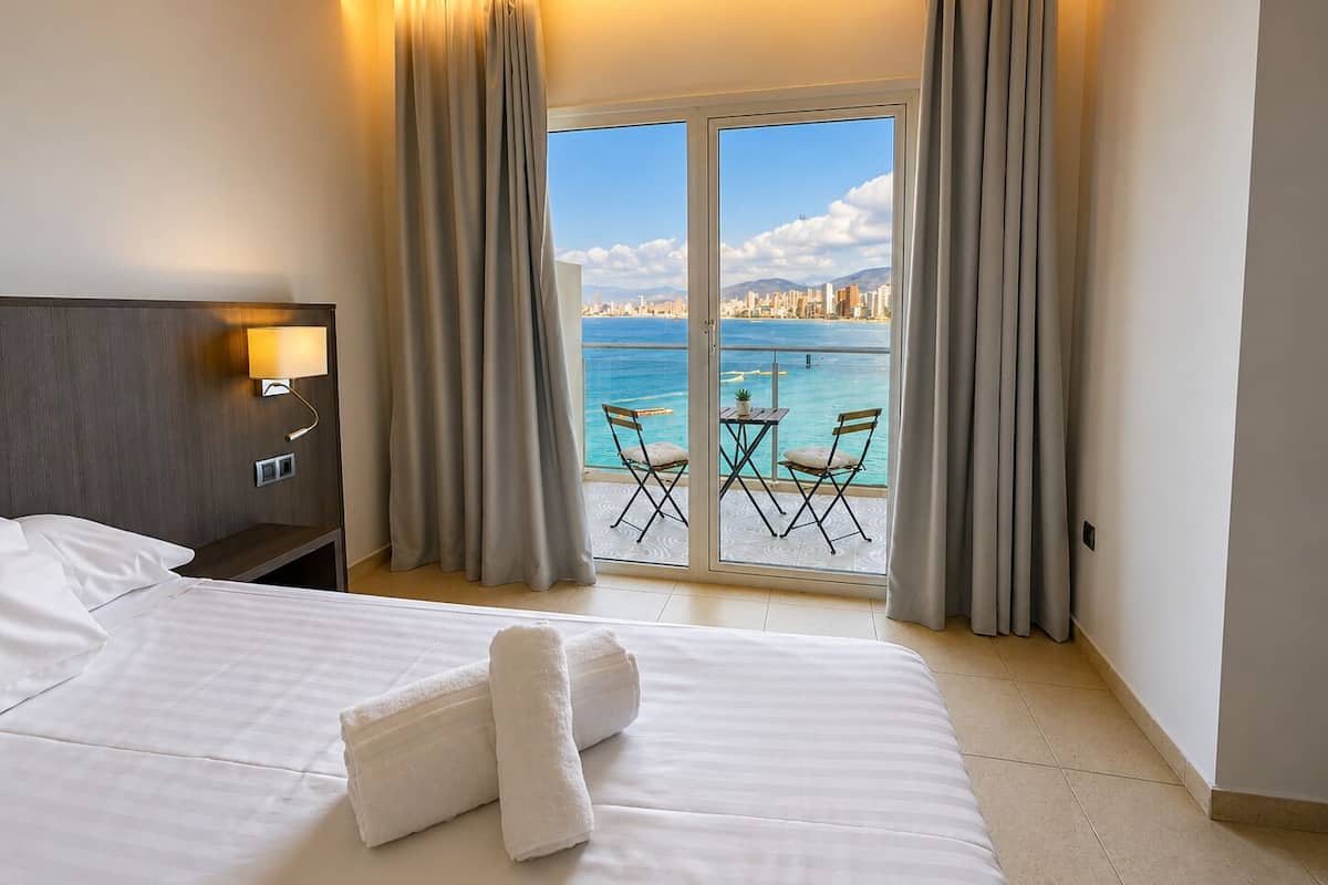 Premium bedding, desk, laptop workspace, blackout curtains