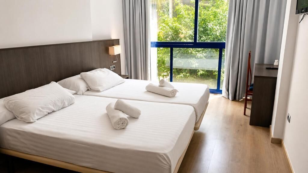 Basic Double Room | Premium bedding, desk, laptop workspace, blackout drapes