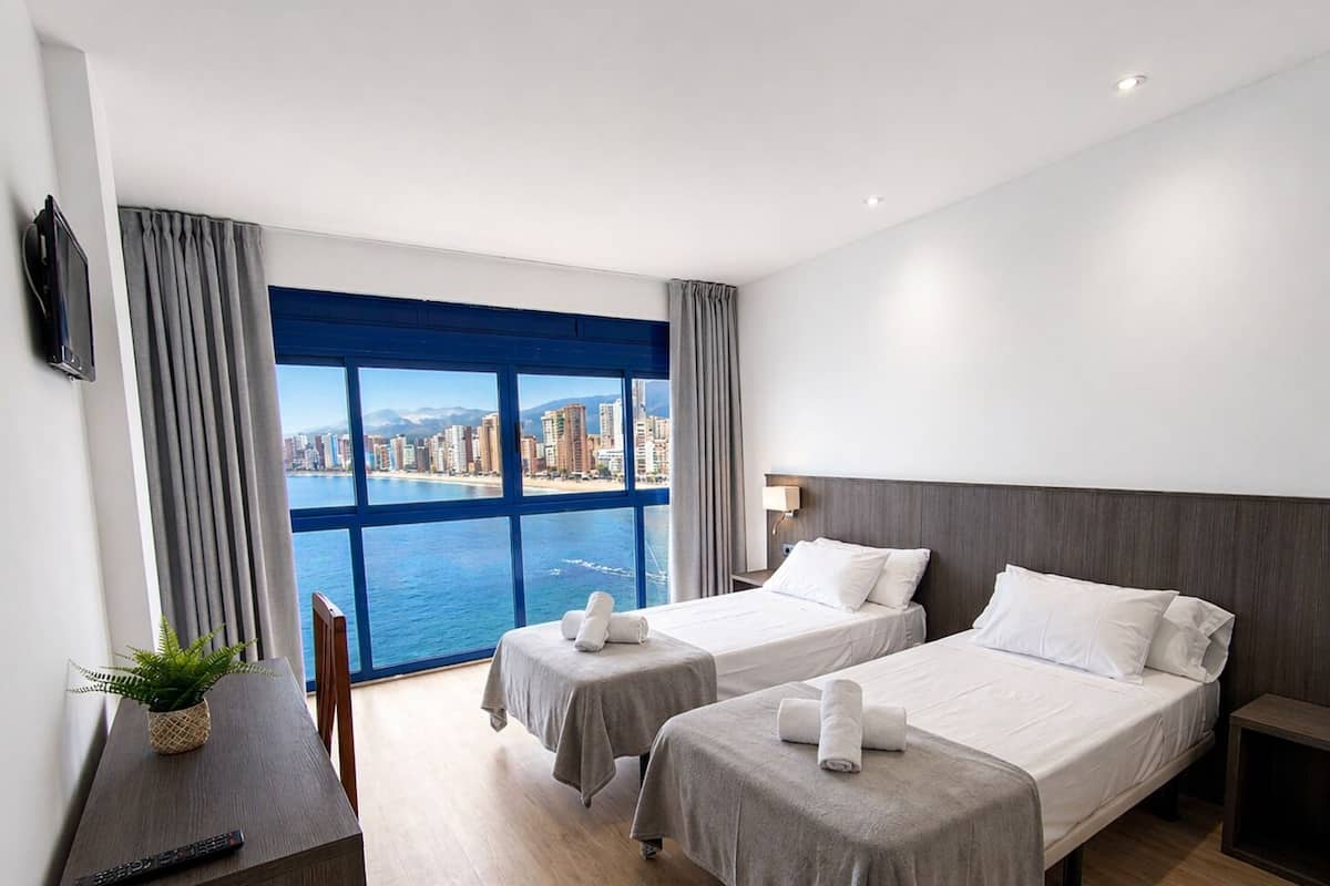 Superior Double Room, Multiple Beds, Sea View, Oceanfront | Down duvets, in-room safe, desk, laptop workspace