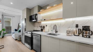 Estúdio conforto, vista para a cidade | Cozinha americana privada