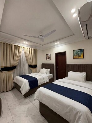 Chambre Luxe Double ou avec lits jumeaux, vue jardin