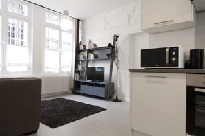 Fridge, microwave, oven, stovetop - Stylish 2BR Loft Steps from St Germain (Paris)
